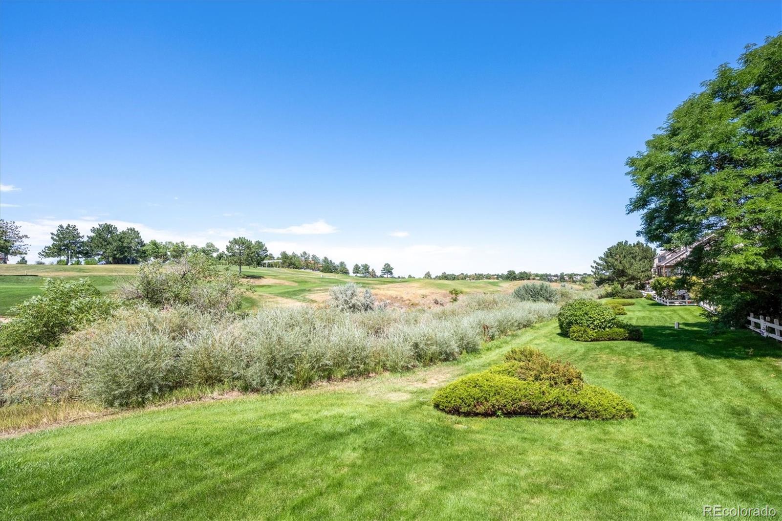 9851 Greensview Circle Lone Tree, CO 80124 - Photo 26 of 27 a view of a green field with clear sky