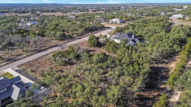 an aerial view of residential house with outdoor space