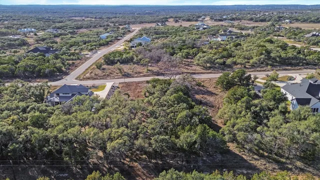 an aerial view of residential house and outdoor space