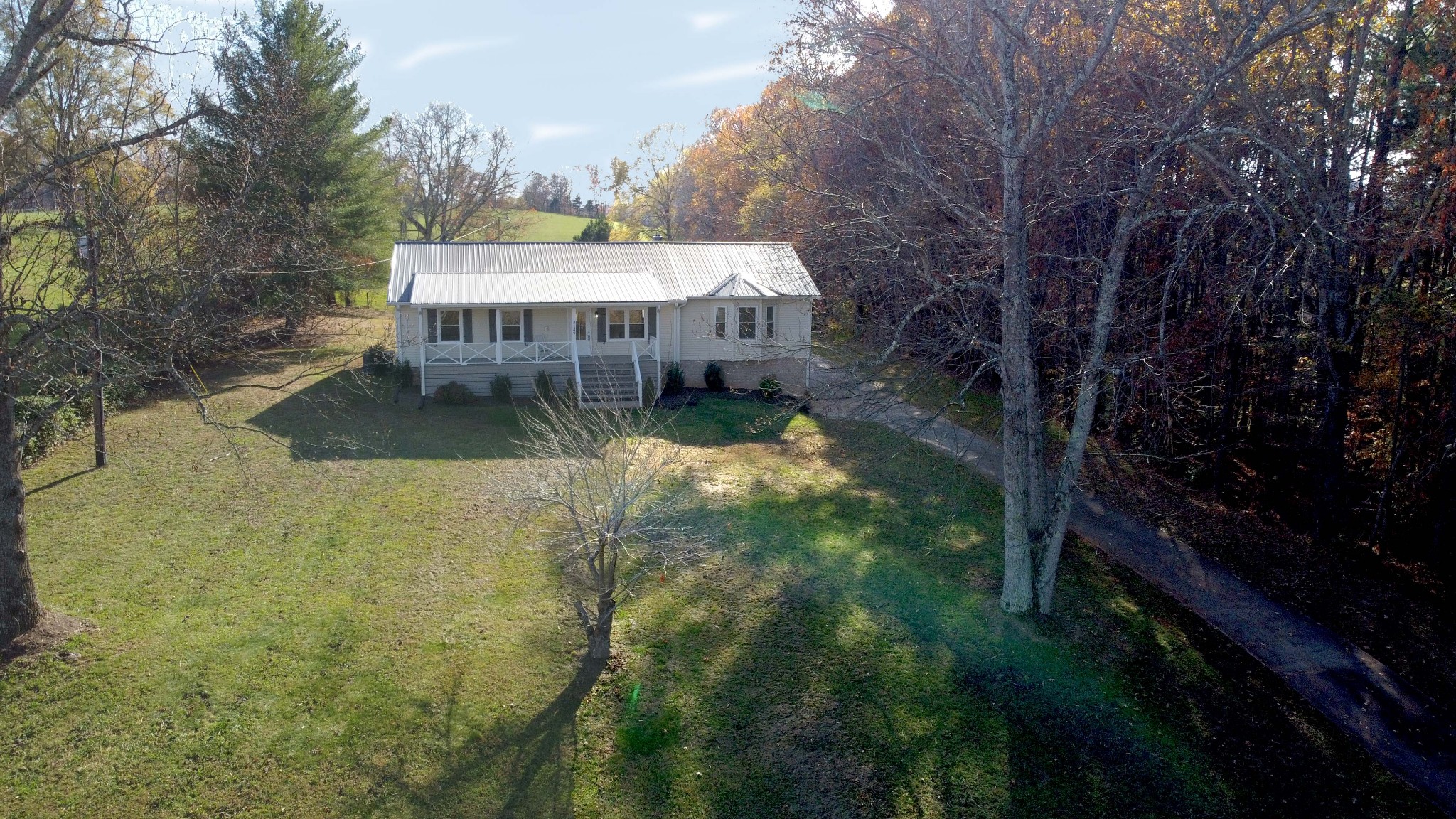 3149 Old Well Road Morrison, TN 37357 - Photo 40 of 43 a view of a house with a yard and sitting area