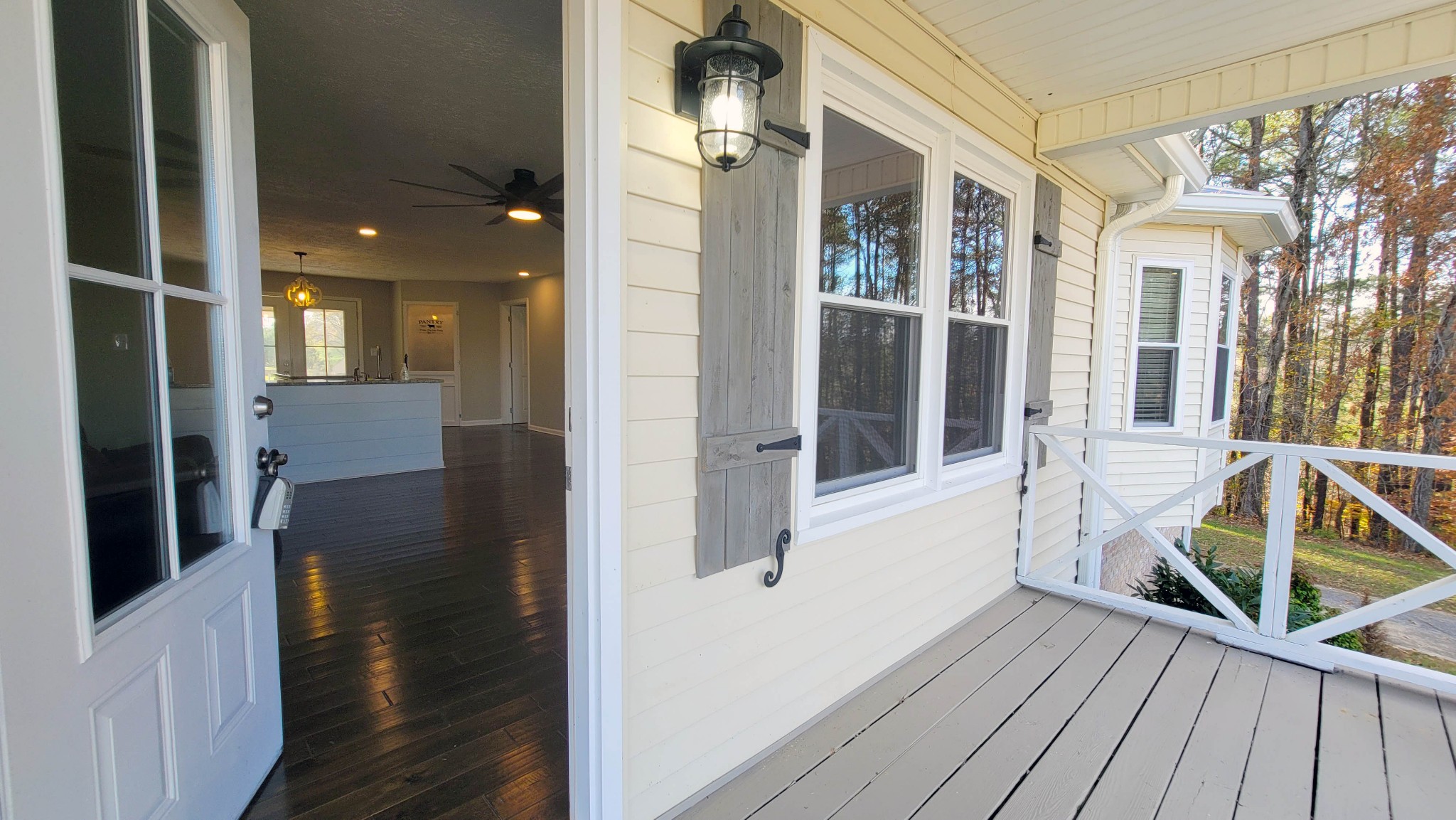 3149 Old Well Road Morrison, TN 37357 - Photo 5 of 43 a view of a porch with wooden floor and furniture