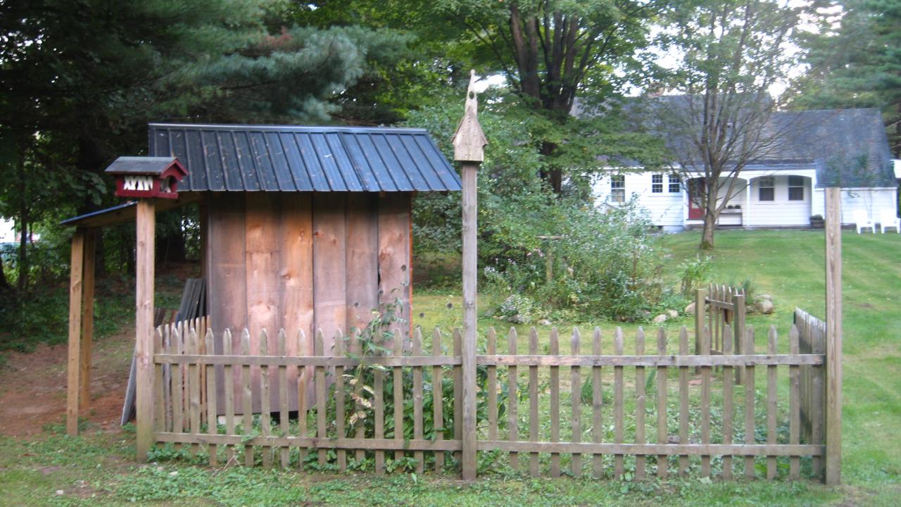 48 Mill Road Stamford, VT 05352 - Photo 9 of 11 a view of a backyard with plants and outdoor seating
