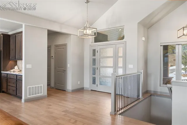 a view of hallway with washer and dryer
