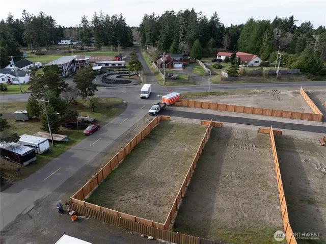 a view of a swimming pool with a yard