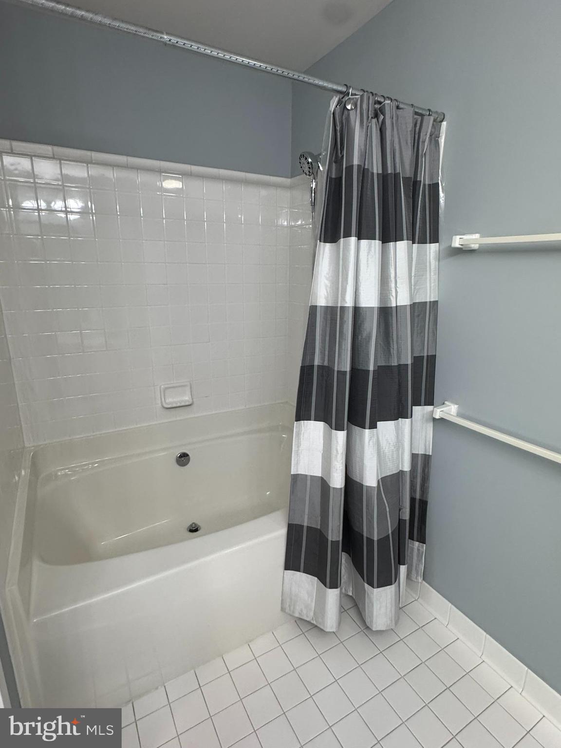 102 Mercer Court, Unit 21 3 Frederick, MD 21701 - Photo 18 of 31 a bathroom with a bathtub and shower