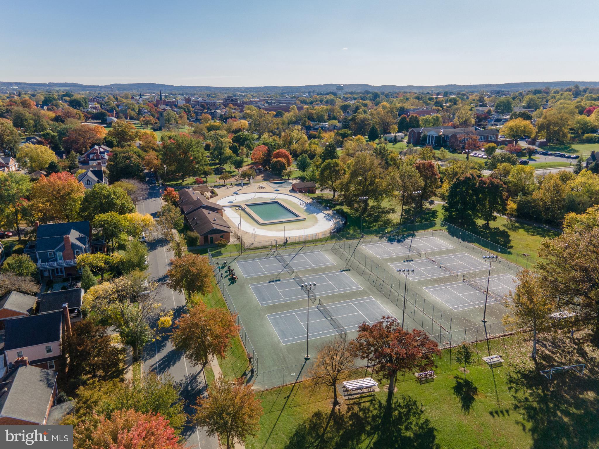 102 Mercer Court, Unit 21 3 Frederick, MD 21701 - Photo 24 of 31 an aerial view of a house with a yard
