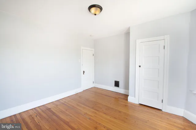 a view of a livingroom with wooden floor