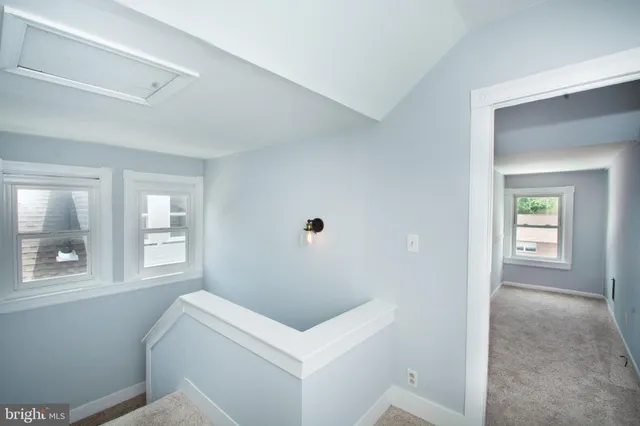 a bathroom with a toilet sink and tub
