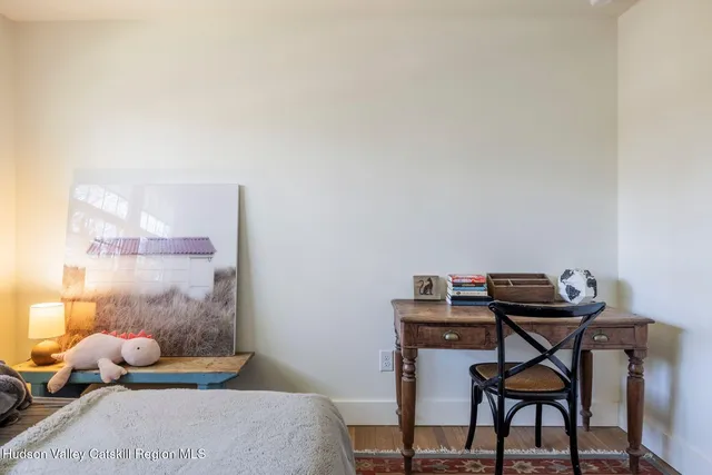 a room with a table and chairs