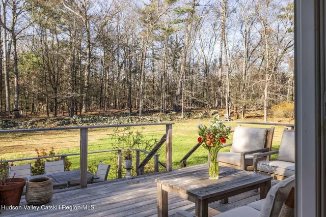 a view of swimming pool with chairs