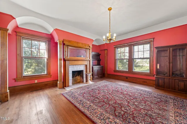 a large kitchen with stainless steel appliances granite countertop a stove and a refrigerator