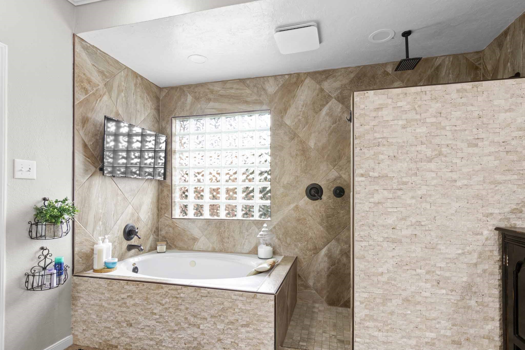 4311 Green Tree Court Pasadena, TX 77505 - Photo 25 of 49 Large shower with soaking jacuzzi tub.