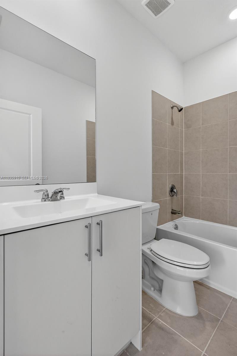 13872 Southwest 262nd Street, Unit 13862 Homestead, FL 33032 - Photo 26 of 43 a bathroom with a sink toilet and shower