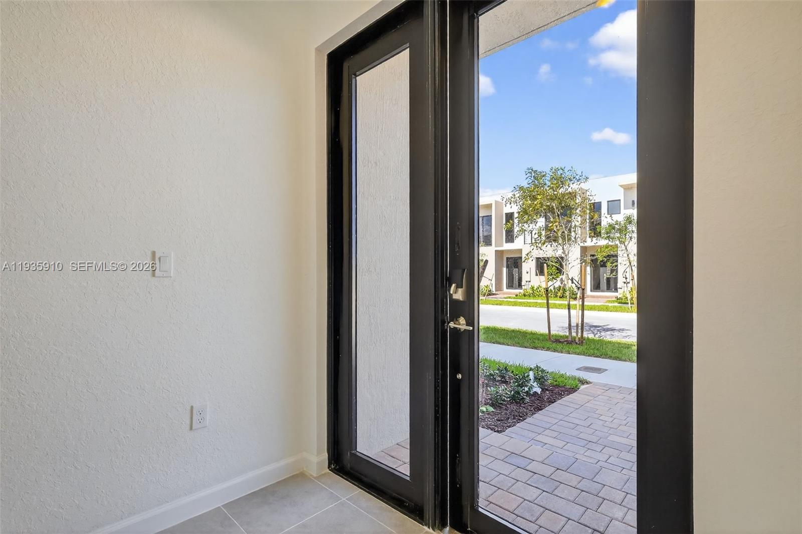 13872 Southwest 262nd Street, Unit 13862 Homestead, FL 33032 - Photo 4 of 43 a view of hallway with wooden floor