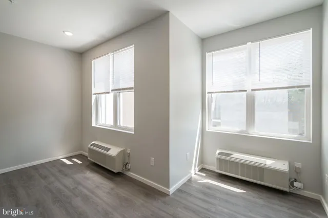 a view of an empty room and window