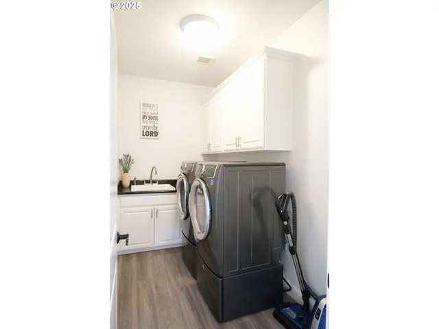 a utility room with dryer and washer