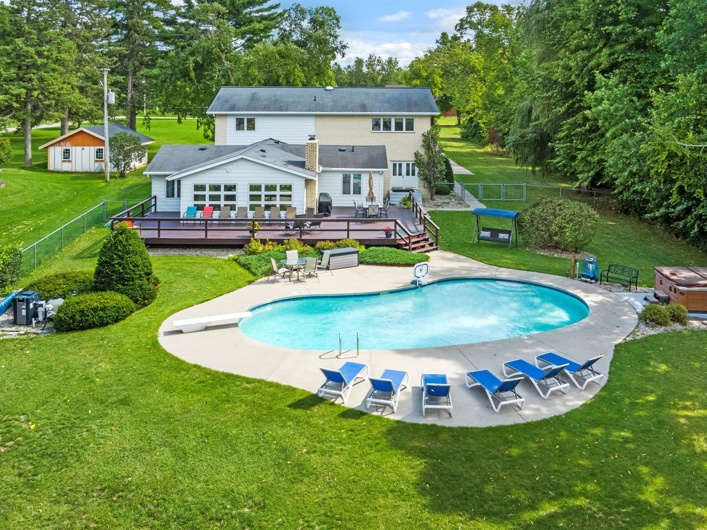 W6336 Circle Drive Crivitz, WI 54114 - Photo 1 of 52 a view of a swimming pool with a garden