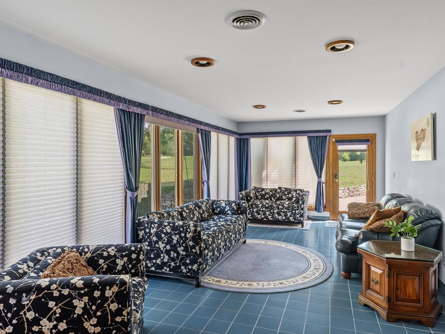 W6336 Circle Drive Crivitz, WI 54114 - Photo 14 of 52 a living room with a large window and chandelier
