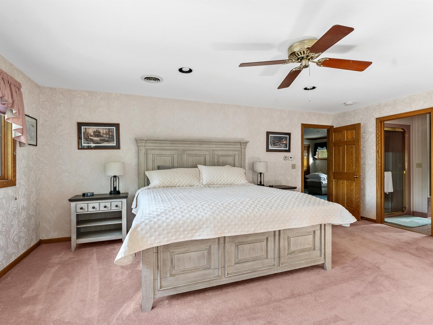 W6336 Circle Drive Crivitz, WI 54114 - Photo 16 of 52 a bedroom with a bed and a chandelier