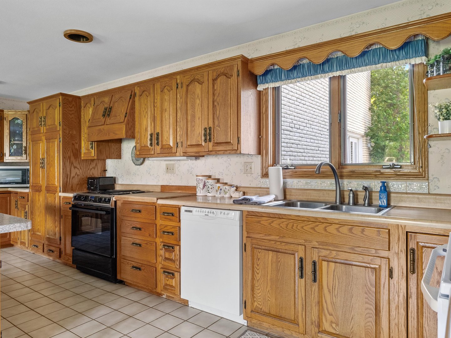 W6336 Circle Drive Crivitz, WI 54114 - Photo 2 of 52 a kitchen with stainless steel appliances granite countertop a stove a sink and a refrigerator