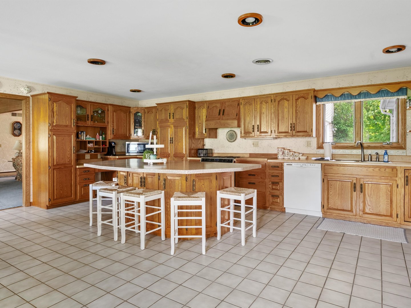 W6336 Circle Drive Crivitz, WI 54114 - Photo 3 of 52 a kitchen with a sink and chairs