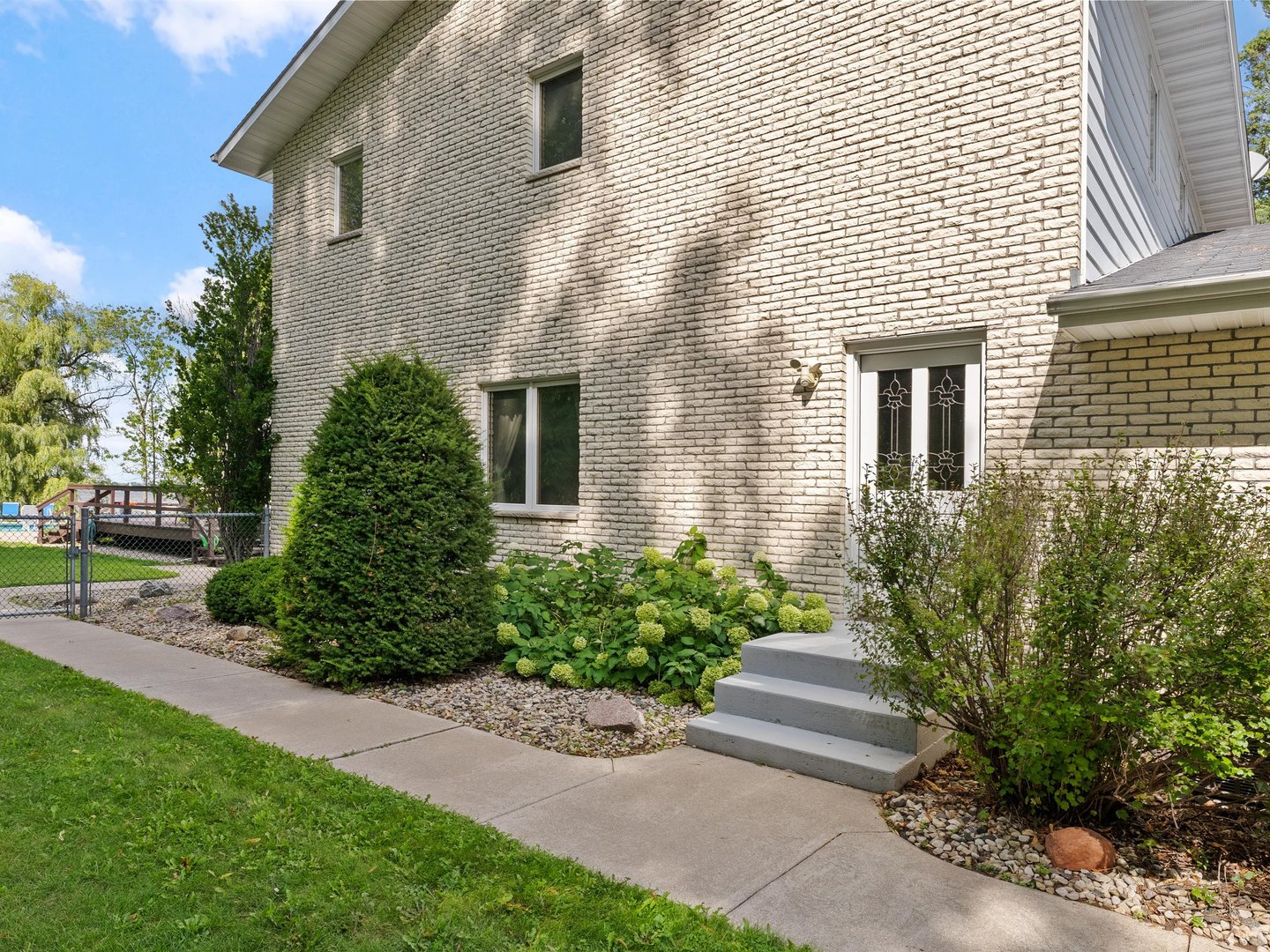 W6336 Circle Drive Crivitz, WI 54114 - Photo 43 of 52 a front view of a house with garden