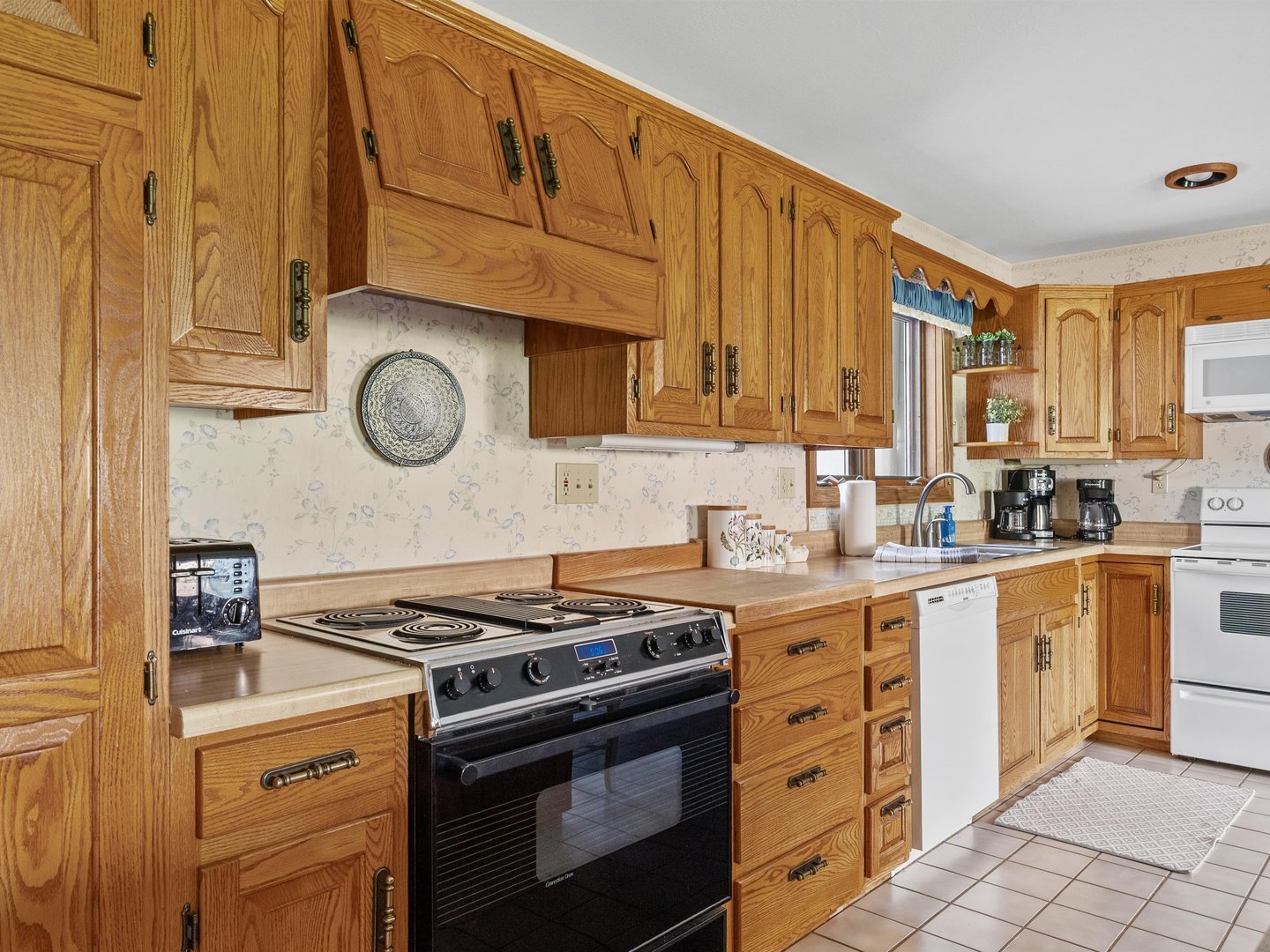 W6336 Circle Drive Crivitz, WI 54114 - Photo 5 of 52 a kitchen with stainless steel appliances granite countertop a stove and a sink