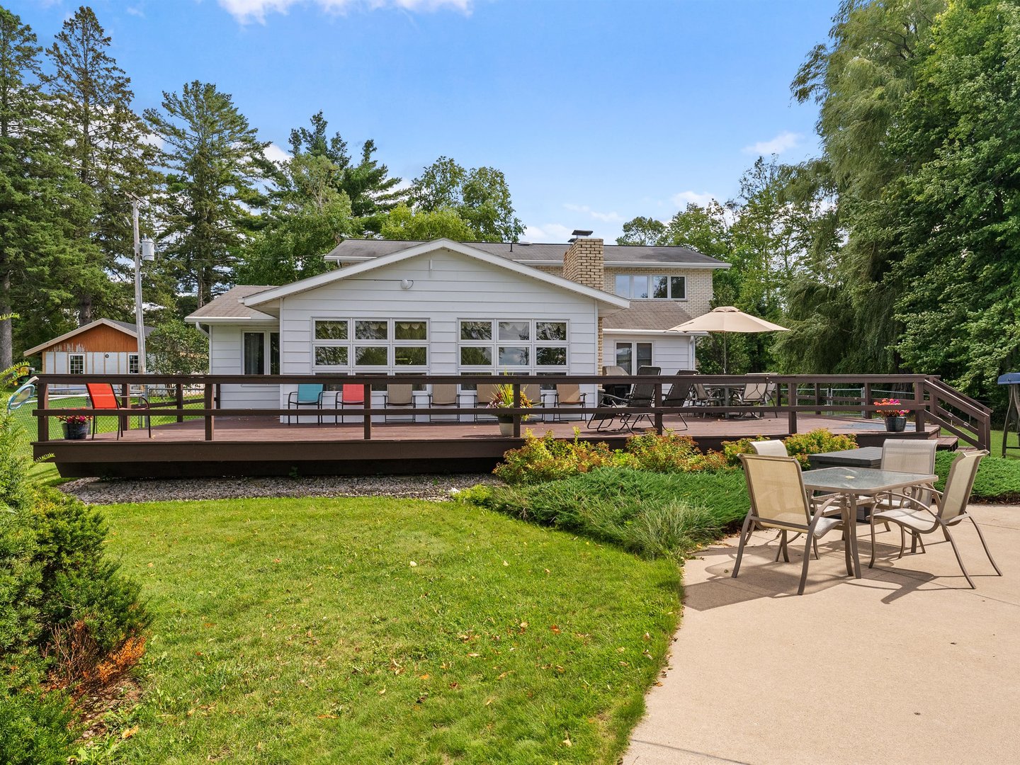 W6336 Circle Drive Crivitz, WI 54114 - Photo 52 of 52 a swimming pool view with a seating space and a garden view