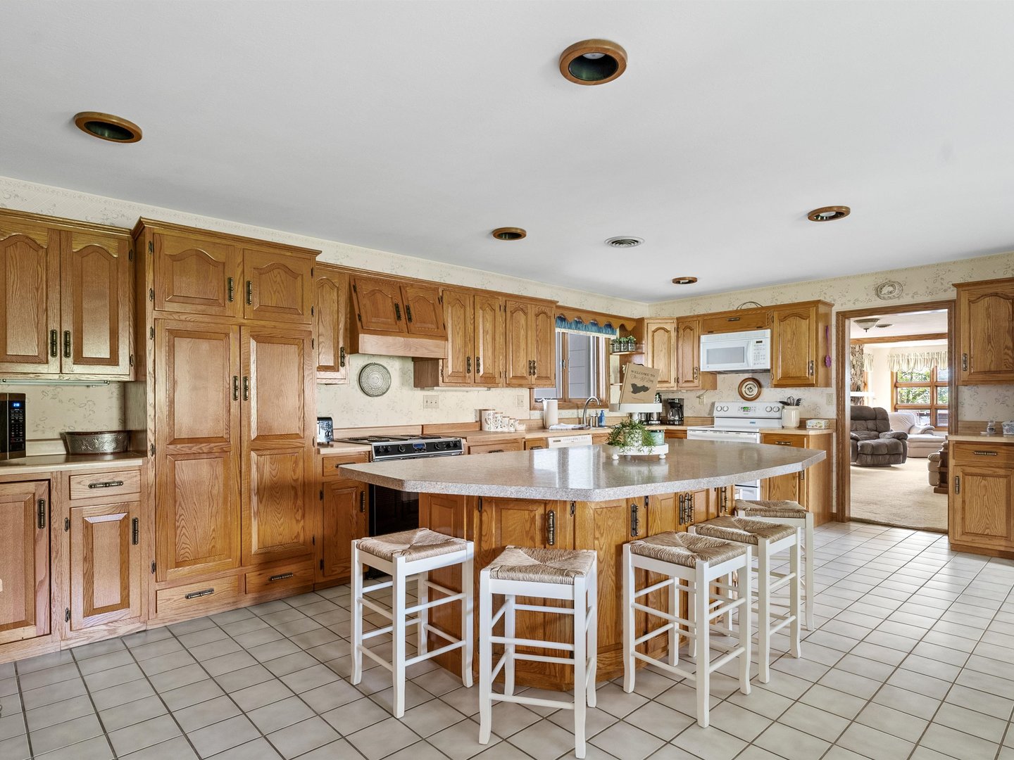 W6336 Circle Drive Crivitz, WI 54114 - Photo 7 of 52 a kitchen with cabinets and chairs