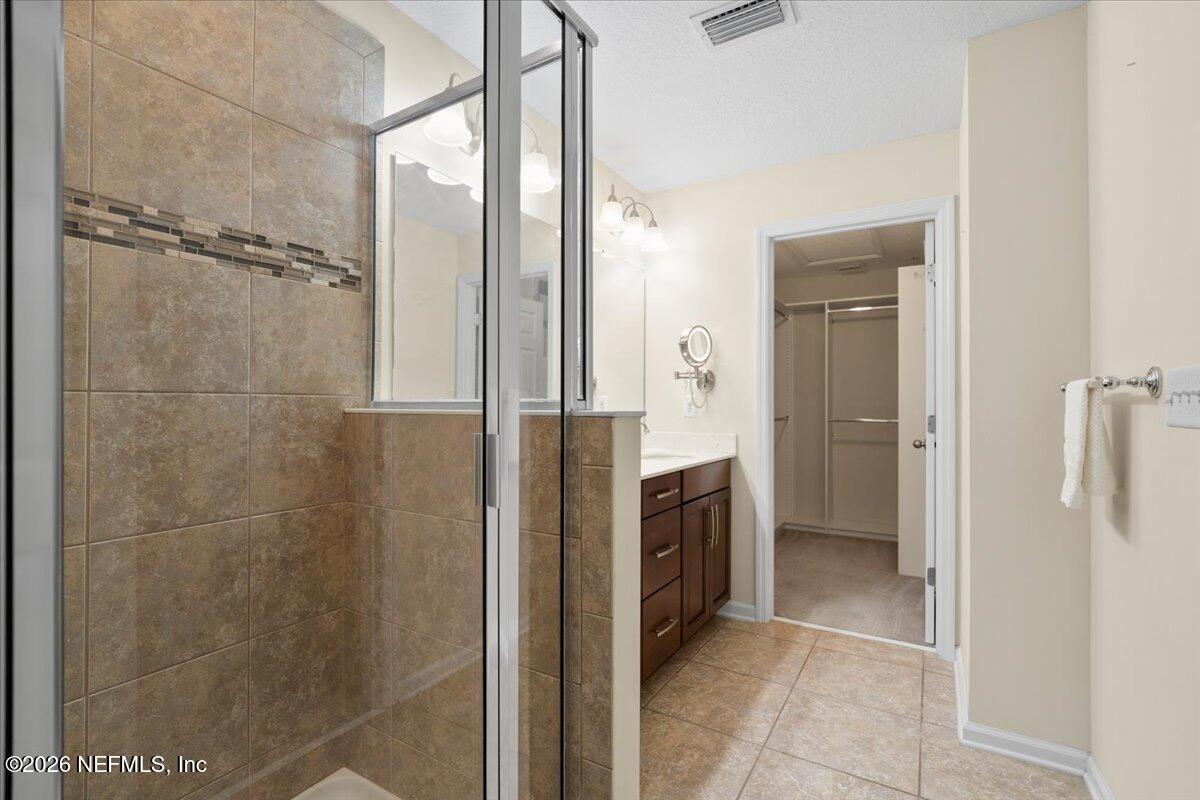 197 Paradas Place St. Augustine, FL 32092 - Photo 26 of 46 a bathroom with a shower and a sink