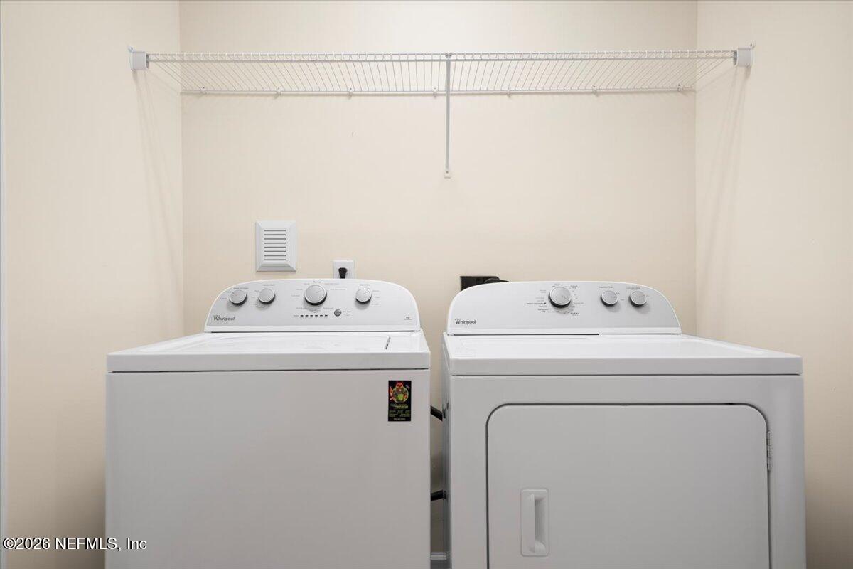 197 Paradas Place St. Augustine, FL 32092 - Photo 33 of 46 a utility room with dryer and washer