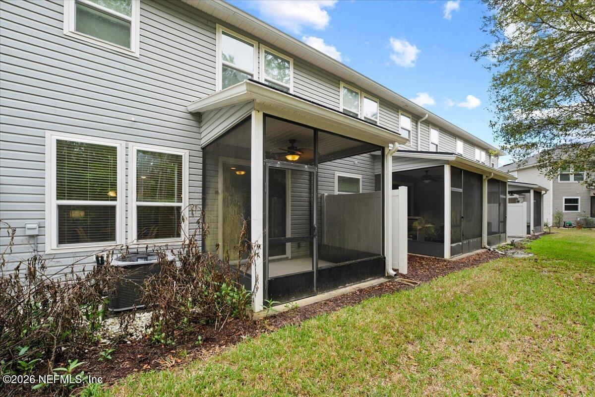 197 Paradas Place St. Augustine, FL 32092 - Photo 36 of 46 a view of house with yard and outdoor seating