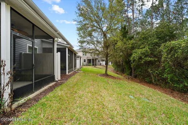a view of backyard of the house