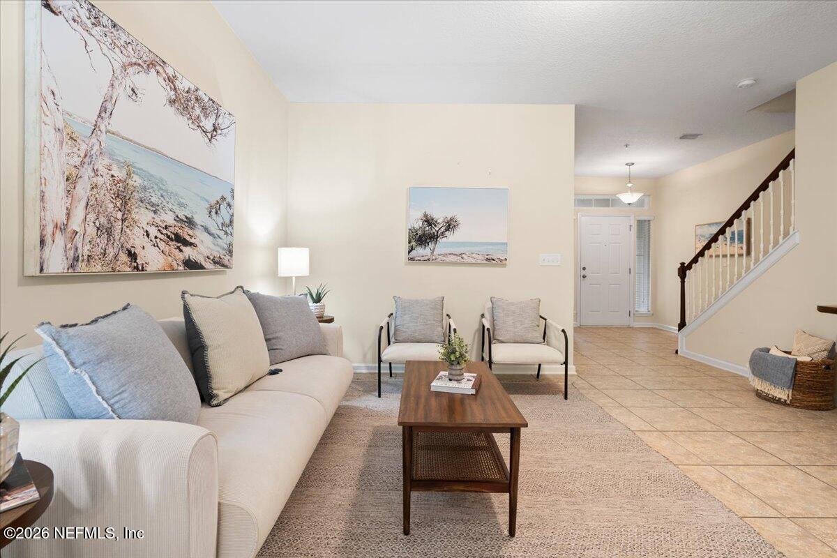 197 Paradas Place St. Augustine, FL 32092 - Photo 7 of 46 a living room with furniture and a painting