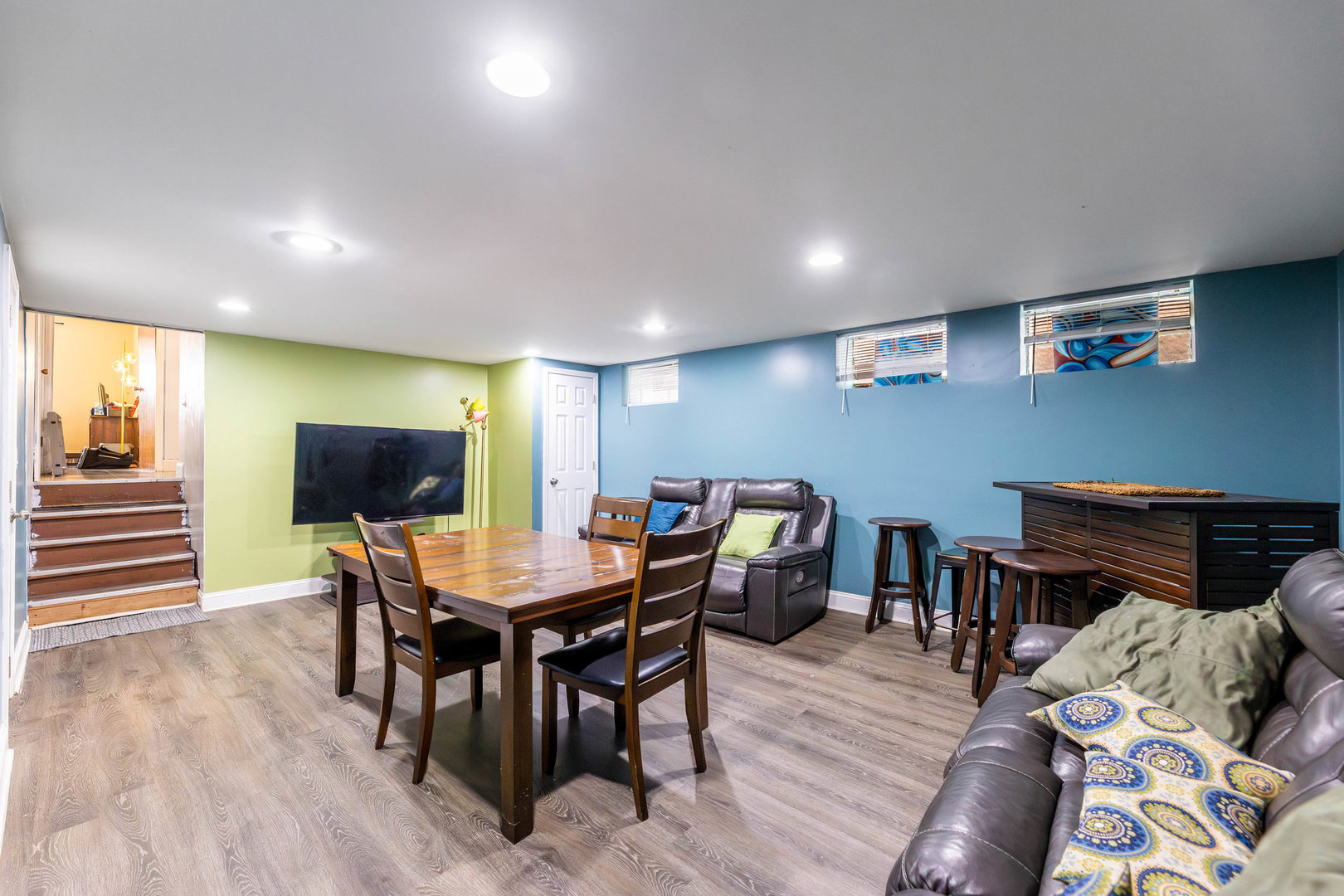 9207 South Halsted Street Chicago, IL 60620 - Photo 14 of 17 a view of a dining room with furniture and wooden floor