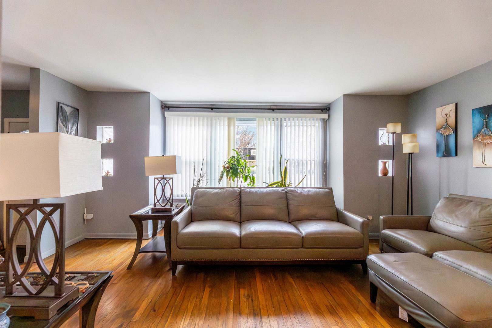 9207 South Halsted Street Chicago, IL 60620 - Photo 2 of 17 a living room with furniture and wooden floor