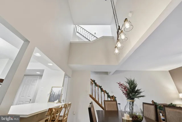 a view of hall way with furniture