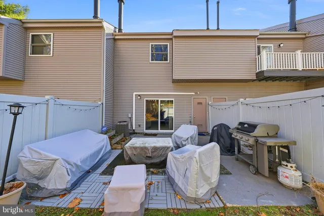 a outdoor space with patio the couches and a dining table with chairs