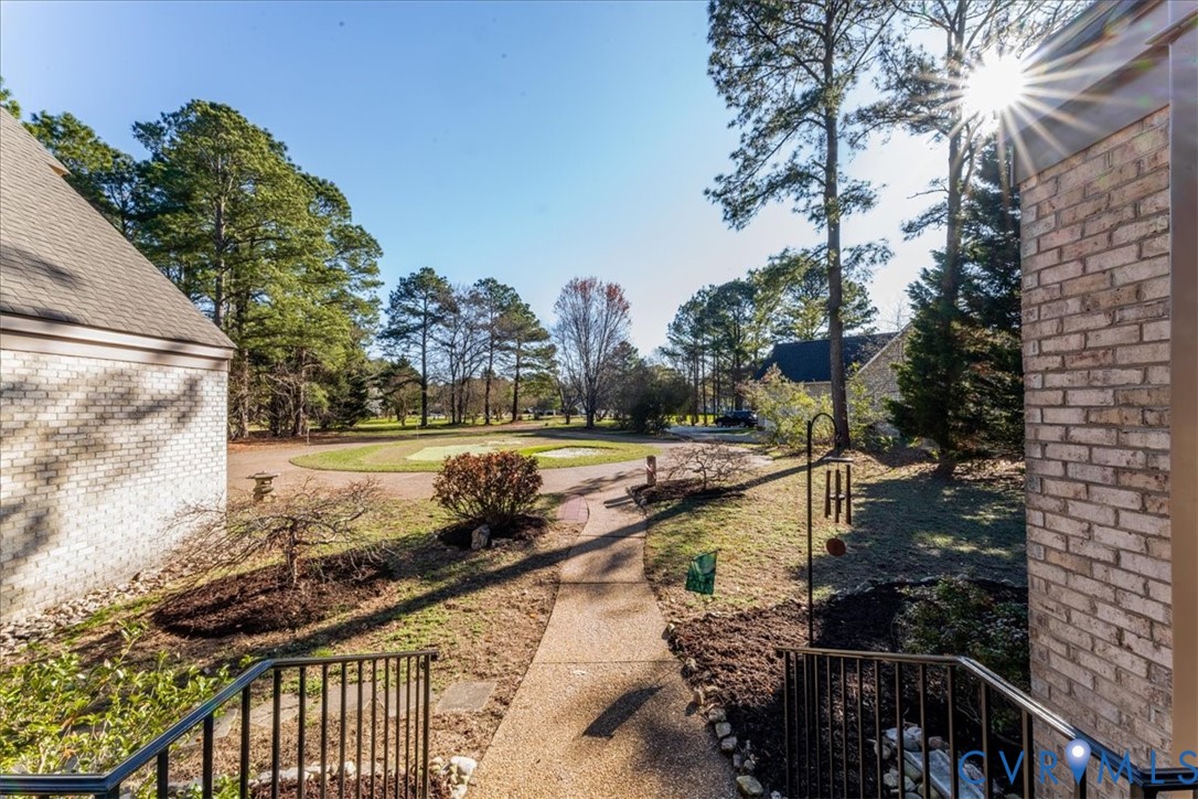 276 Colony Trail Lanexa, VA 23089 - Photo 28 of 39 a view of a yard and front view of a house
