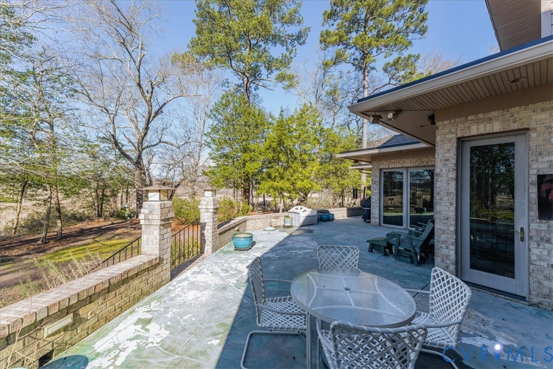 276 Colony Trail Lanexa, VA 23089 - Photo 35 of 39 a view of a house with backyard and sitting area