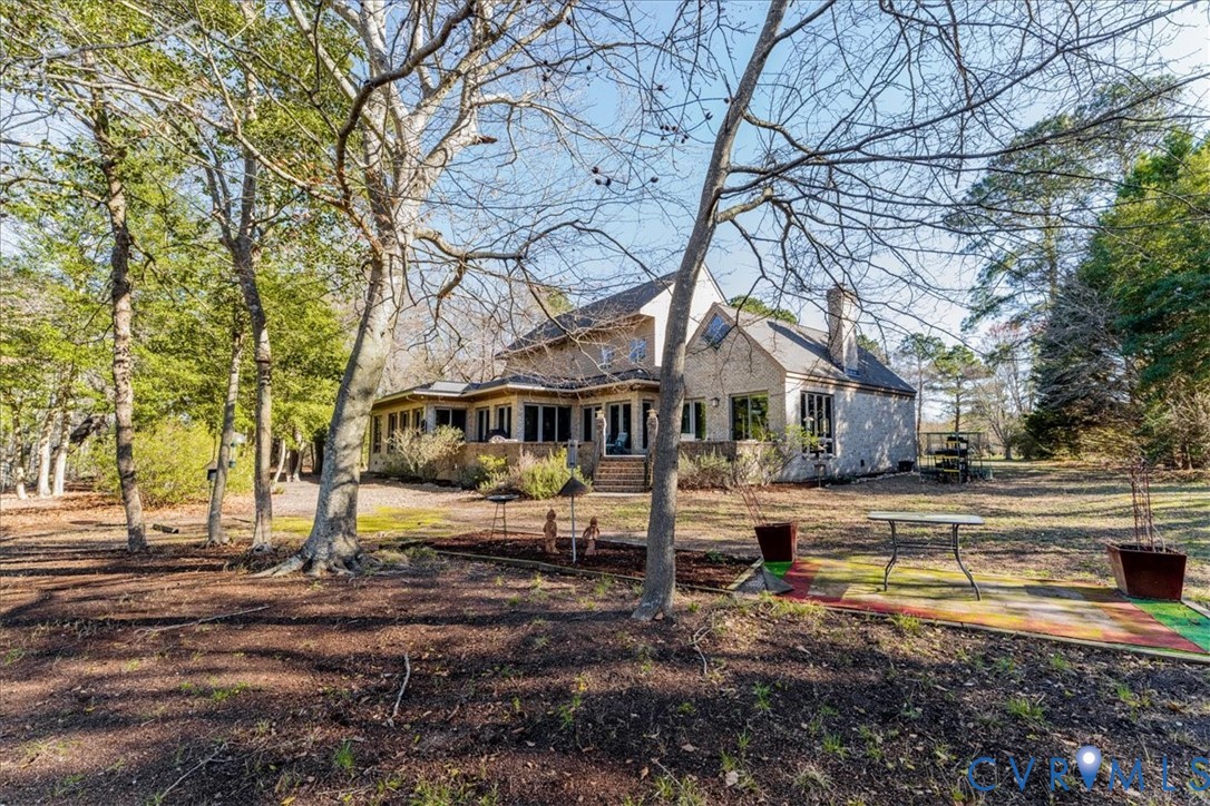 276 Colony Trail Lanexa, VA 23089 - Photo 38 of 39 a front view of a house with a yard