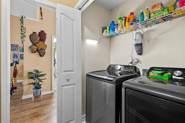 a utility room with dryer and washer