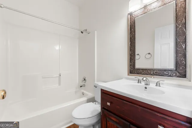 a view of a small space with racks on the wall