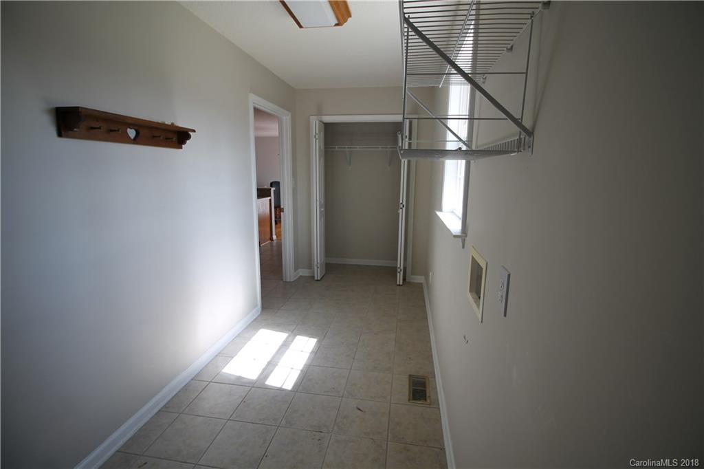 1215 Micol Road Newton, NC 28658 - Photo 11 of 12 a view of entryway and hall with a window