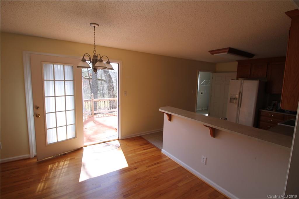 1215 Micol Road Newton, NC 28658 - Photo 8 of 12 a view of a room with wooden floor