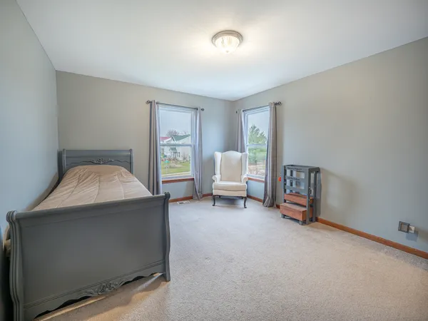a view of livingroom with furniture and a window