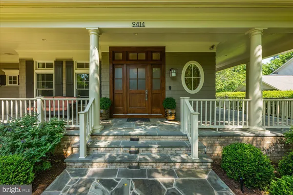 a view of a pathway of a house with a porch