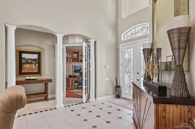 a view of swimming pool with a patio