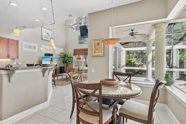 a building outdoor space with patio furniture and potted plants