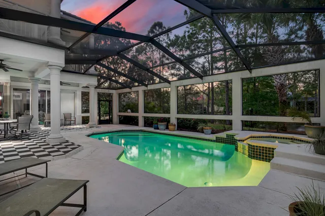 a bedroom with furniture and a flat screen tv